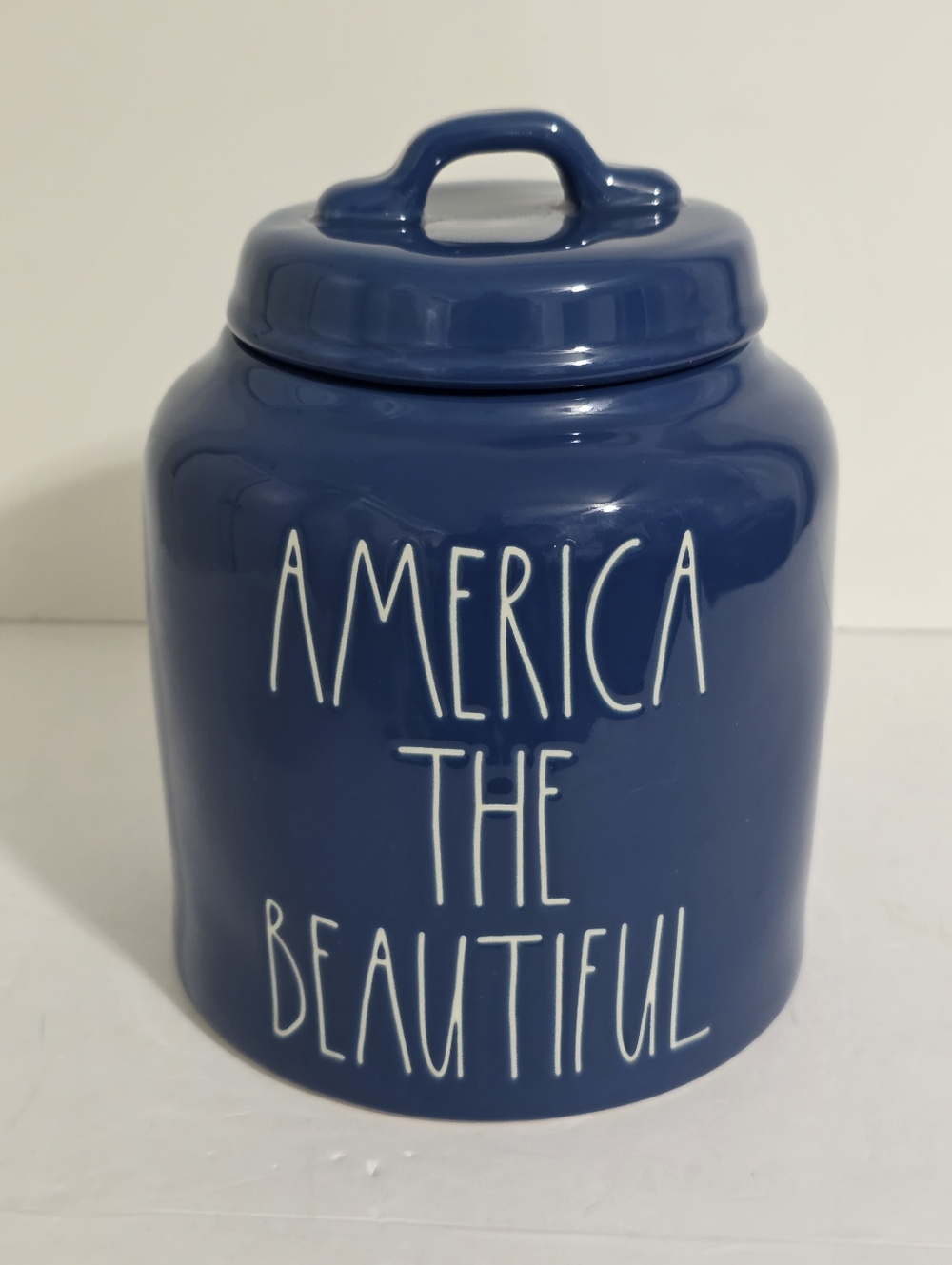 Rae Dunn Blue Ceramic Canister with White Lettering